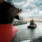 Eminox OE Marine tug boat pulling ship